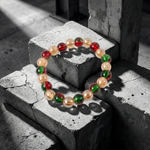 Glossy fashion beads making up colorful stretch bracelet for girls and women