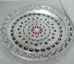 Elegant silver plated pooja thali, perfect for Indian traditional worship and ceremonies.