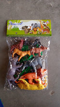 Detailed view of plastic wild animal figures from educational Animal Kingdom toy set