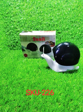Packaging for the portable snail shape liquid soap dispenser.