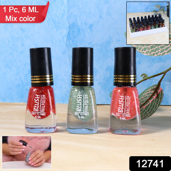 Close-up of vibrant glitter mini nail polish in mix colours