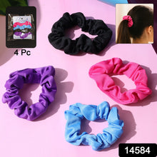 Woman with long hair wearing a soft hair scrunchie in a high ponytail, showcasing its comfortable hold.