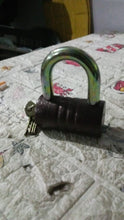 Close-up of the FortiLock brand logo on the heavy-duty iron padlock.