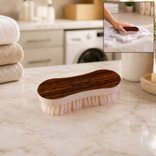 Lifestyle shot of the laundry brush in use for cleaning surfaces