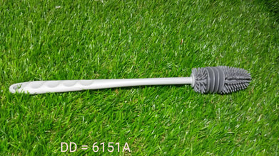 A bottle cleaning brush shown cleaning a narrow-necked bottle with ease.