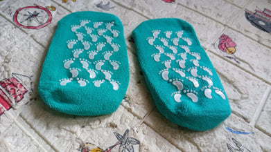 Person wearing the soft socks, demonstrating their comfortable fit for healing dry feet.