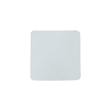 Flat lay of transparent square nano adhesive tape pads