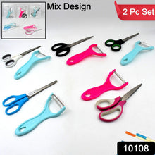 Ergonomic handled kitchen scissor and peeler, showcasing their comfortable grip.