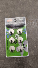 Self adhesive wall hooks displayed on interior wall