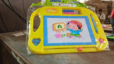 A child's hand demonstrating the easy-erase function of the magic sketch slate by sliding the bar.