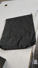 Varied mix colors and designs of the foldable water-resistant nylon drawstring backpacks.