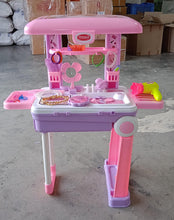 Child enjoying the pretend play beauty set, exploring various accessories for role-play.