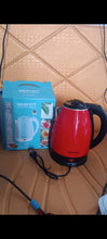 The Siplix electric kettle featuring its concealed stainless steel heating element for durability.