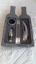 Wine bottle-shaped case with complete wine accessory set