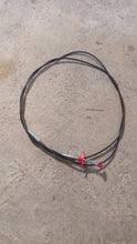 The effective drain cleaner tool with its spring and claw, designed for easy clog removal.