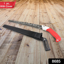 A hand pruning saw with a red handle and a black sheath lying on a light wooden floor, with a red banner in the corner.