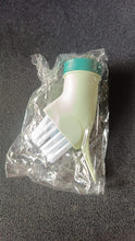 Cleaning brush connected to water bottle for easy water dispensing while scrubbing