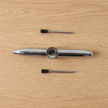 Compact multifunction spinner pen for stress relief and writing