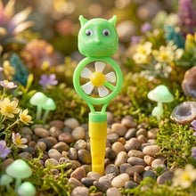 Brightly colored kids toothbrush and accompanying animal whistle toy set