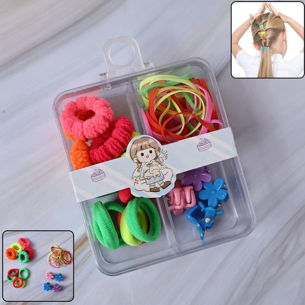 Kids hair accessories set with colourful elastic bands and cute clips inside a transparent storage box.