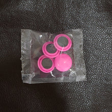 A collection of Round Fridge Magnets in multiple hues, perfect for home and office use.