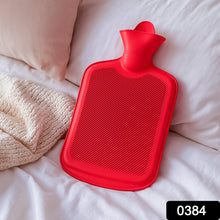 Durable rubber hot water bag with ribbed surface for better heat retention.