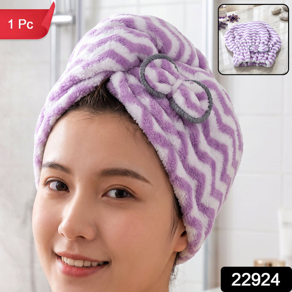 A woman smiling with a purple and white chevron hair towel wrap on her head, with a small inset showing the towel.