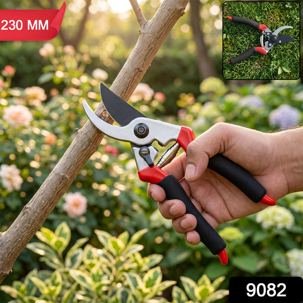 A hand holding red and black garden pruners next to a tree branch, with a small inset image of the pruners.