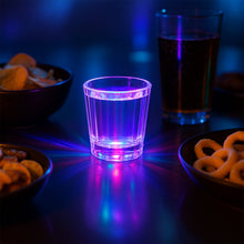 Glow-in-the-dark LED shot glass set adding party décor ambiance
