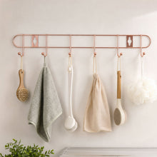 Wall mounted hook rail for towels and utensils